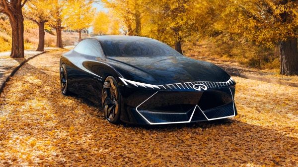 2024 INFINITI Vision Qe electric car surrounded by leaves