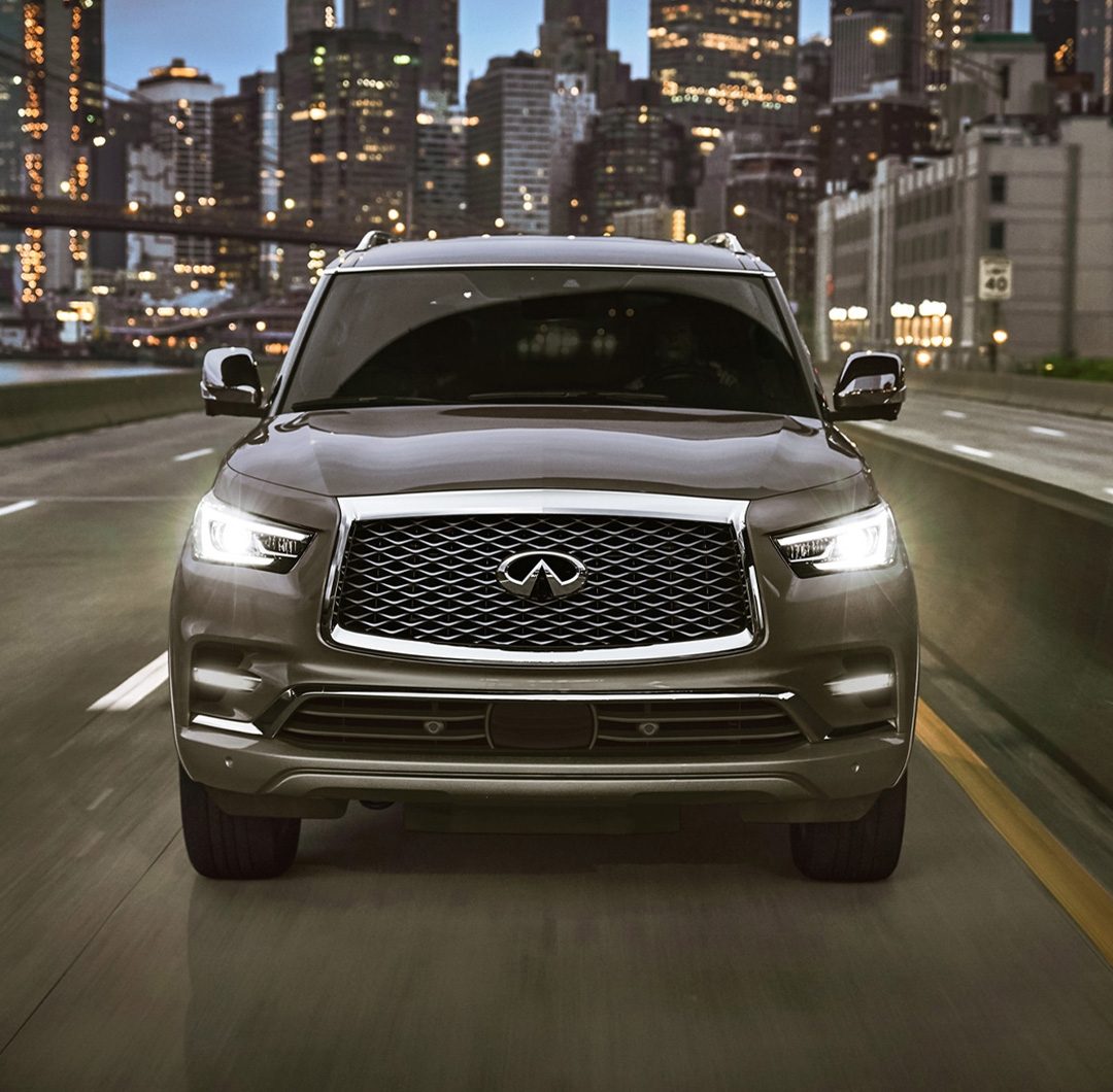 Front view of a dark grey 2024 INFINITI QX80 7-8 passenger SUV