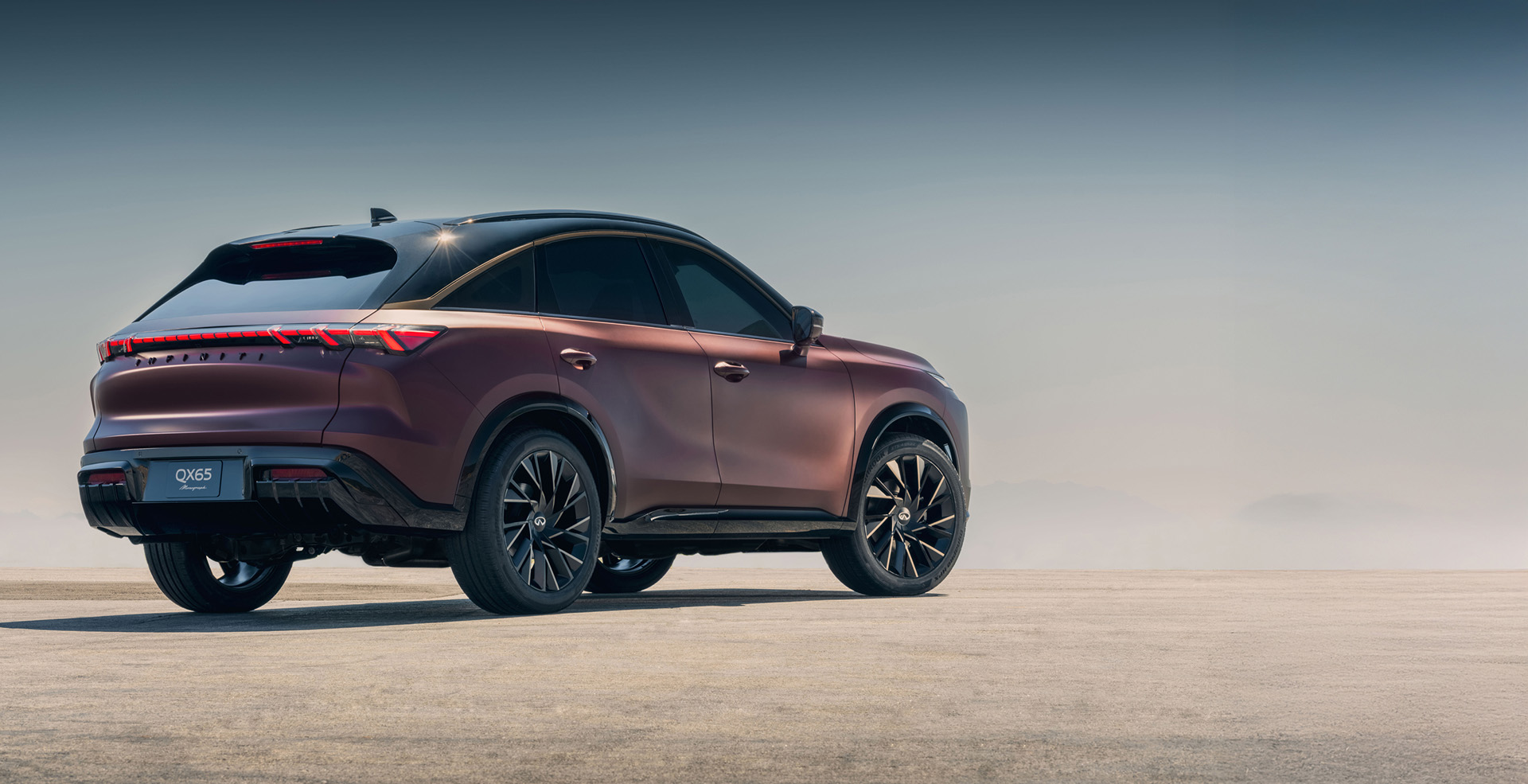 Monograph teaser with INFINITI logo and vehicle in silhouette