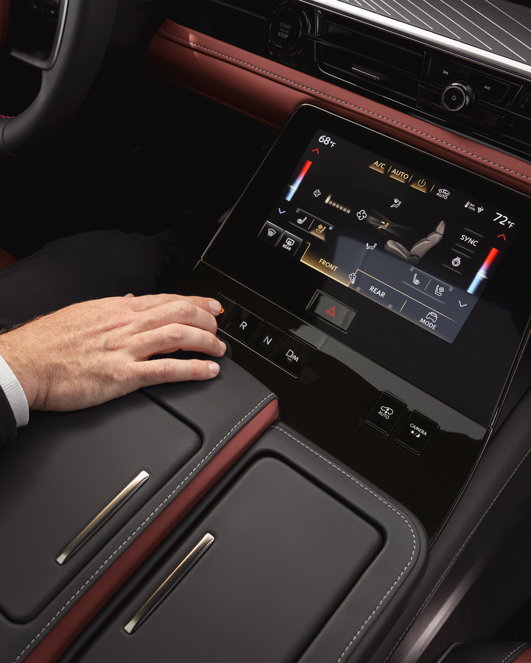 Hand selecting gear with INFINITI IQ Technologies touchscreen
