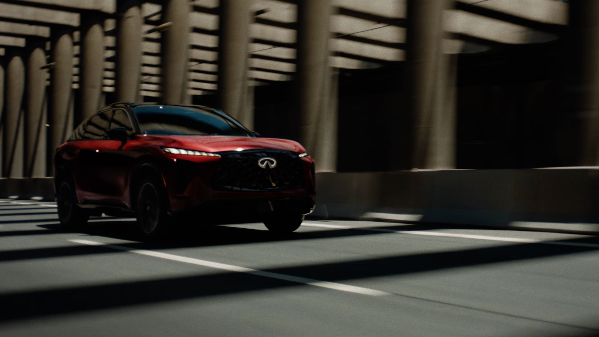 INFINITI SUV driving through tunnel demonstrating engine power and endurance