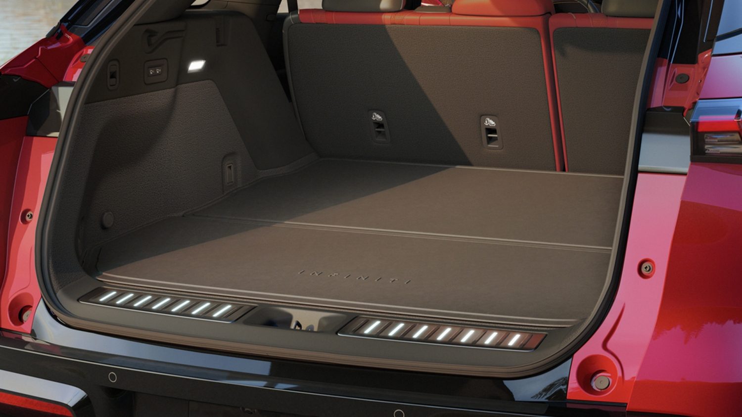 QX55 cargo area with seats down to show expandable luggage capacity