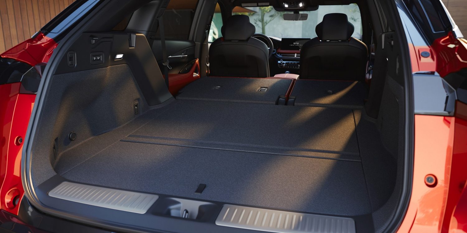 INFINITI QX65 cargo area with rear seats folded flat for expanded storage space