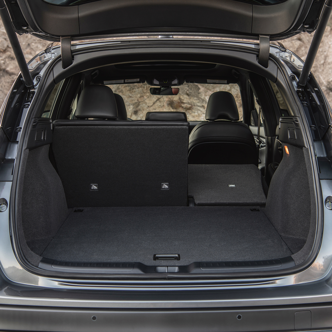 INFINITI QX50 cargo area with rear seats folded for expanded storage capacity