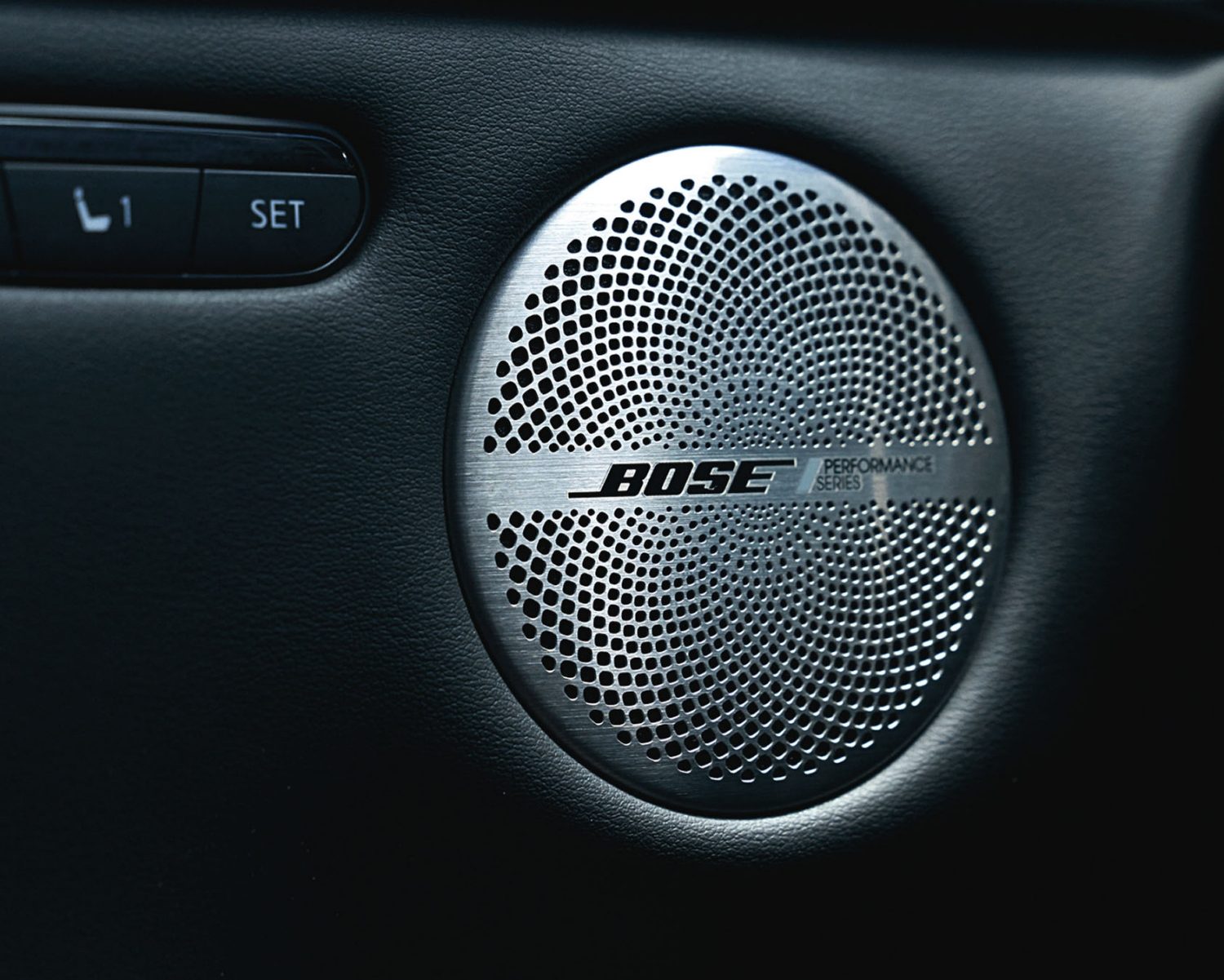 Bose Performance Series premium audio speaker integrated into the INFINITI QX55 cabin