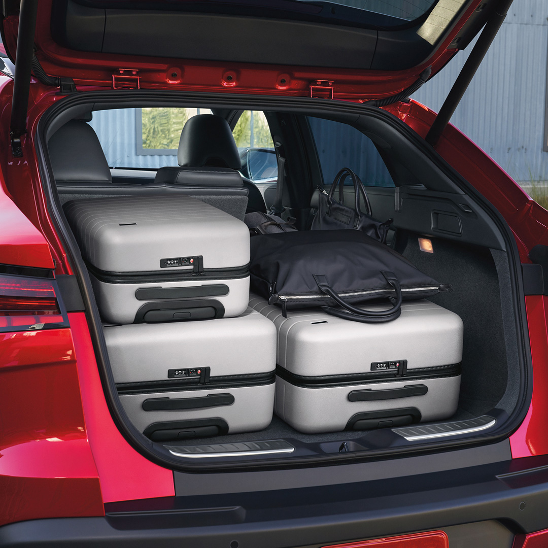 INFINITI QX55 cargo area with rear seats folded for expanded storage capacity