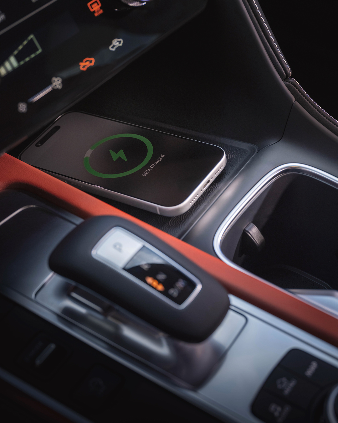 INFINITI QX65 wireless charging pad and center console storage area