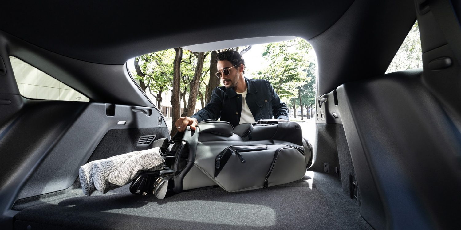 2027 INFINITI QX65 cargo area loaded with luggage demonstrating cargo capacity