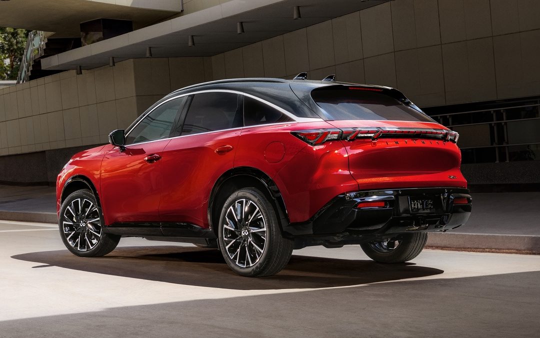 INFINITI QX65 luxury sportback SUV shown from the rear three-quarter view in a modern urban setting